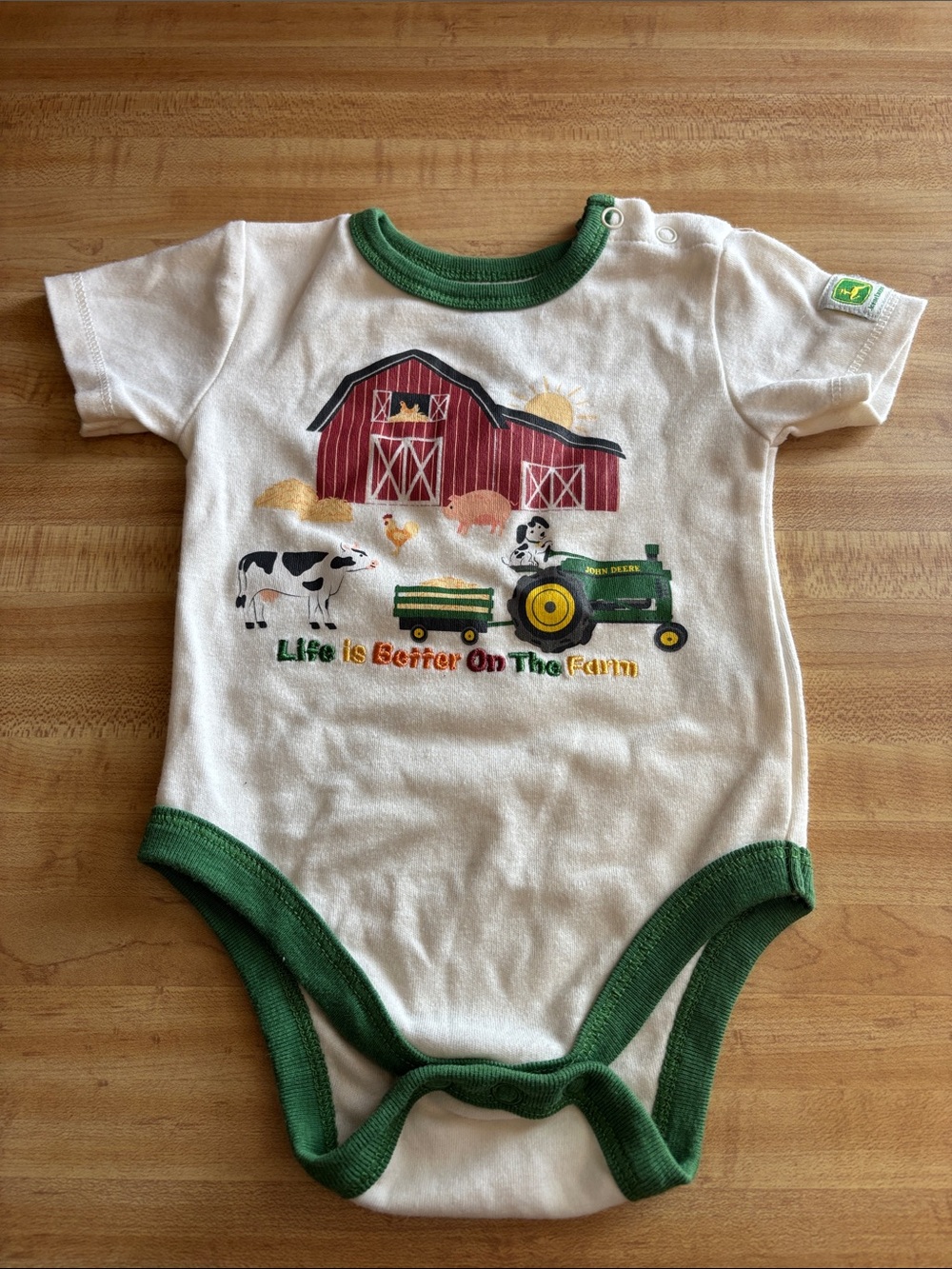 John Deere White Baby Onesie with Green Trim and Farm Graphics